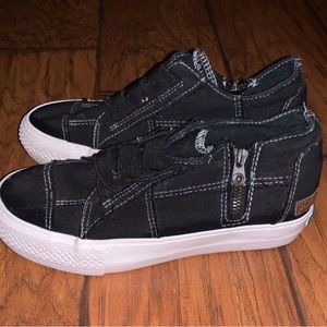 Brand new blowfish wedged close toes, black and white. Zips on the side